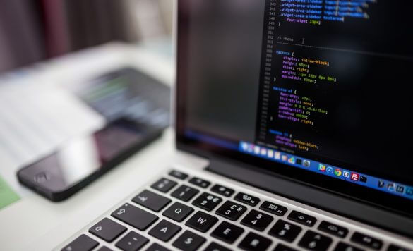 code text on laptop
