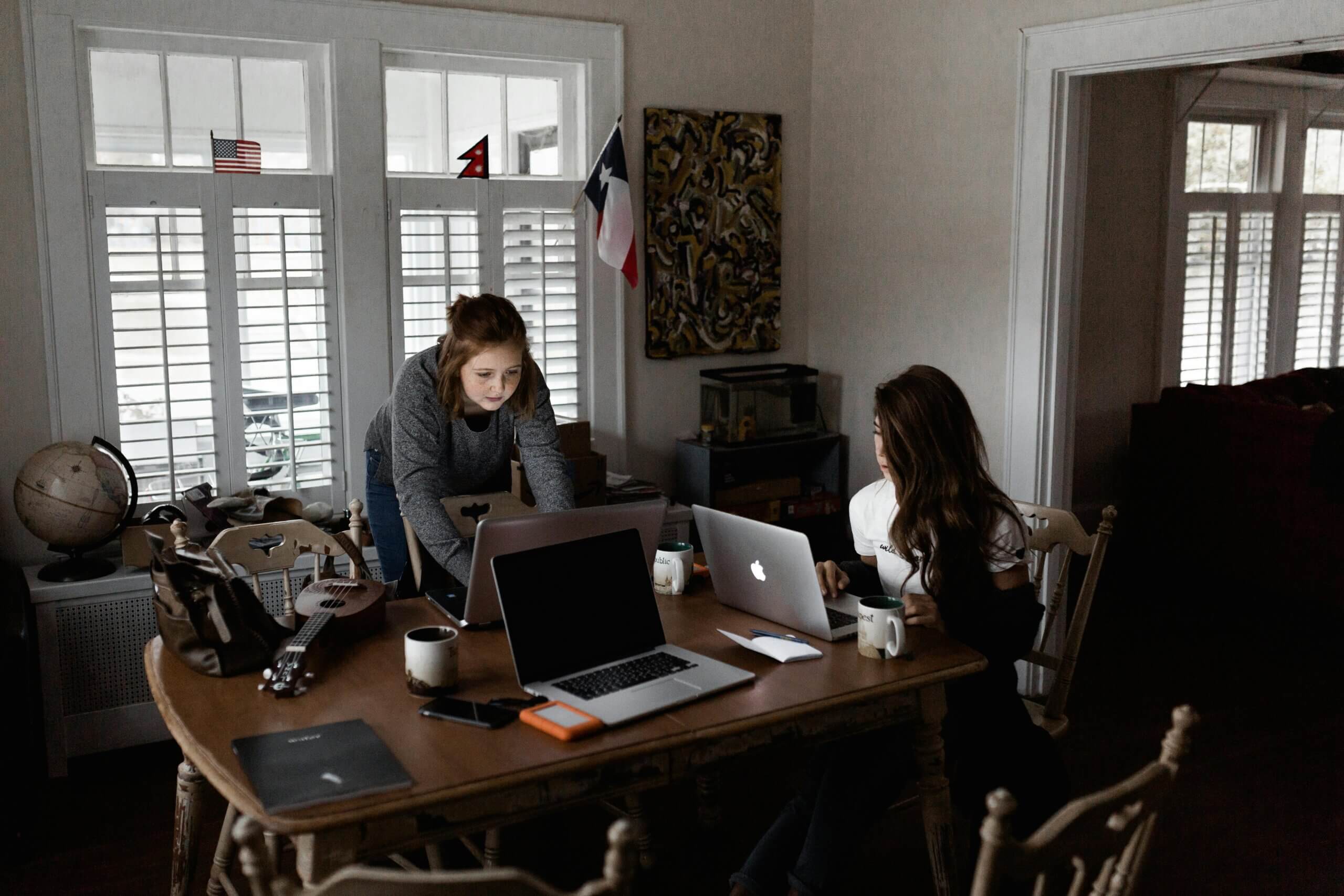 Photo Of Women Using Laptops to Work in Tech